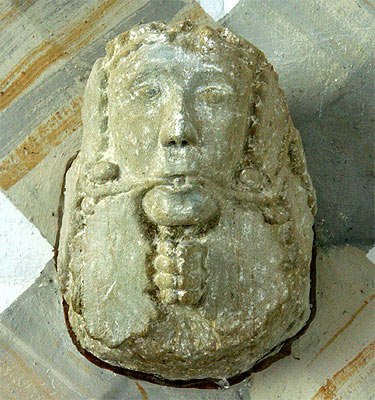 carved stone face in church at Grossgoelitz